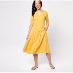 Peace Love World Regular Knit to Woven Asymmetric V-Neck Dress - a world of fashionable women's clothing, including a wide selection of dresses and trendy accessories.< Dresses